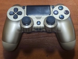 [UŻYWANY] Kontroler Pad PS4 DualShock 4 V1 = CUH-ZCT1E = Złoty / Gold